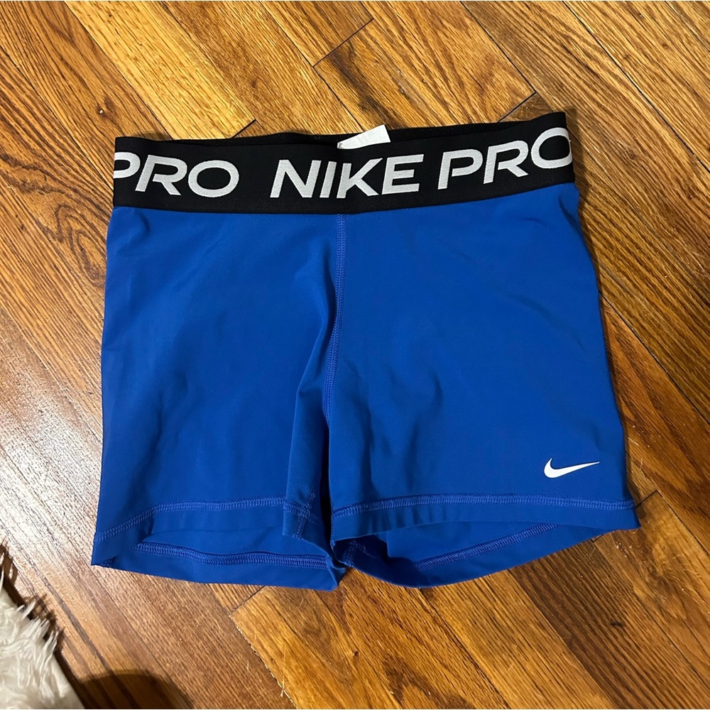 Blue Nike pros